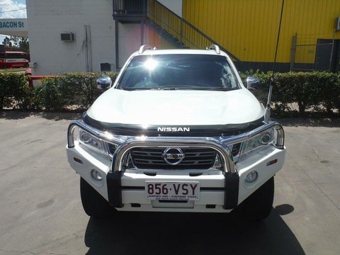 White Nissan SUV With Protector Bar