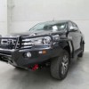 Black Toyota SUV With Protector Bar