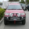 Red Toyota SUV With Protector Bar